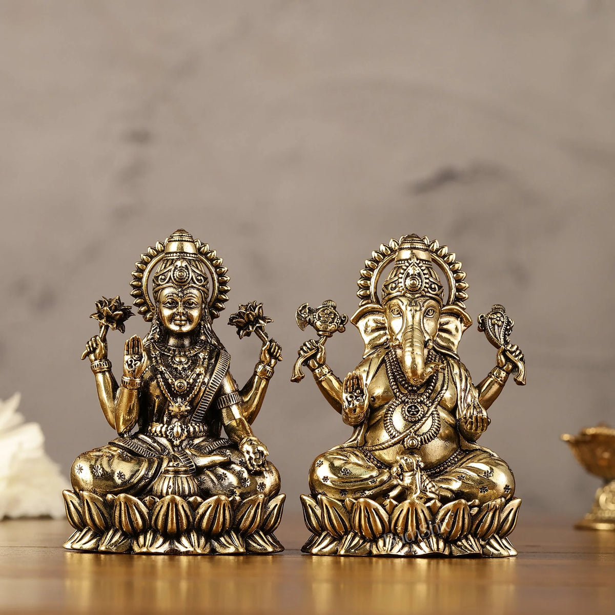 Brass Superfine Ganesha Lakshmi Idols - close up