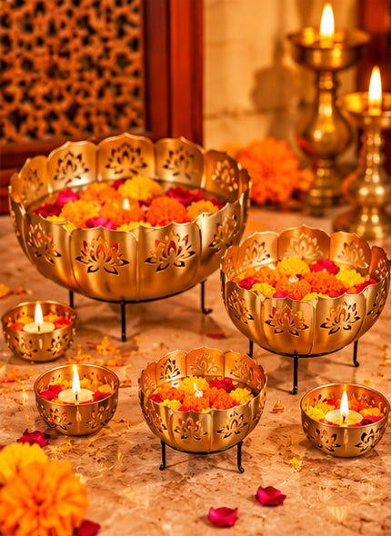 Lotus cut-work gold urli set with votives, styled in a festive setting