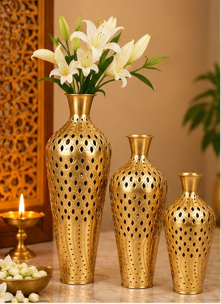 Perforated gold vases set of 3, styled in a festive setting