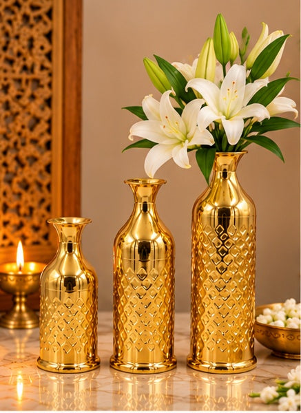 Diamond cut gold bottle vases set of 3, styled in a festive setting
