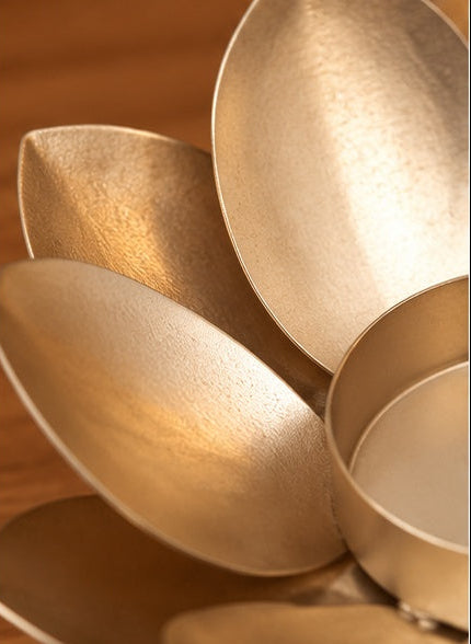 Gold lotus tealight holder, close-up detail