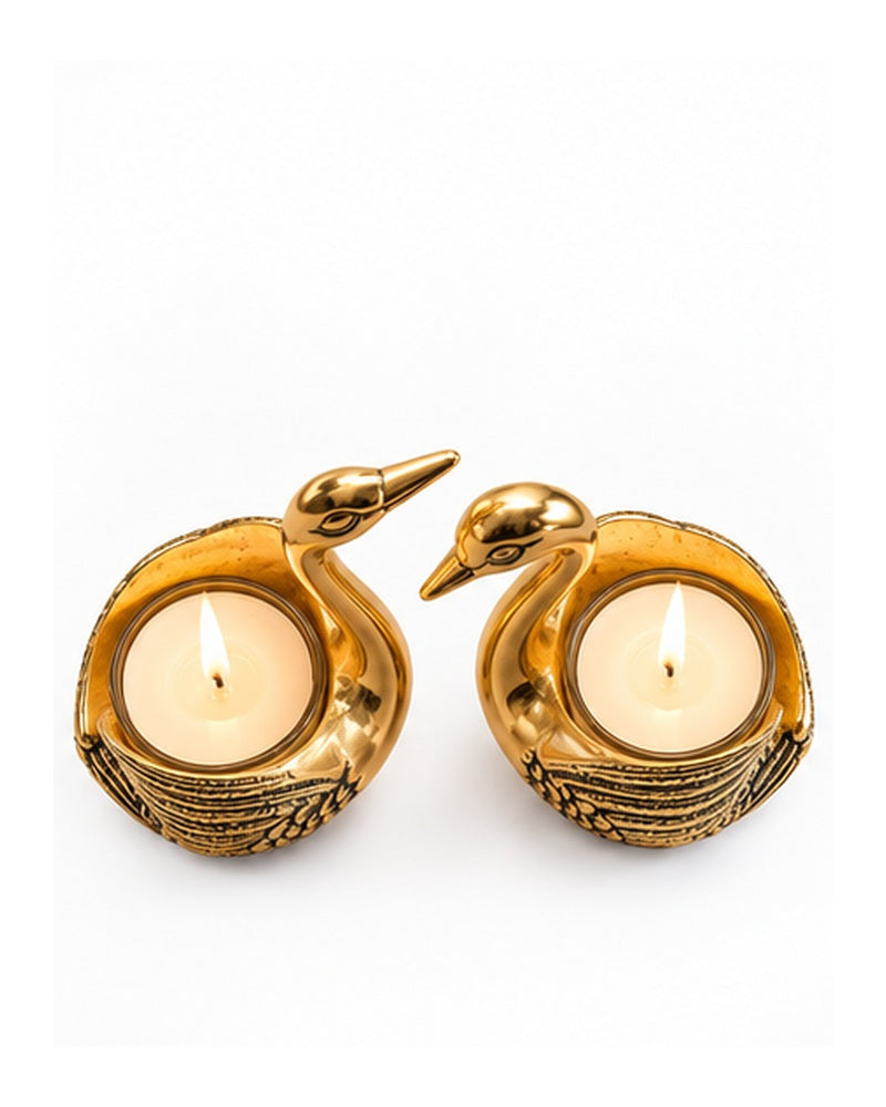 Overhead view of the two swan holders with tealights