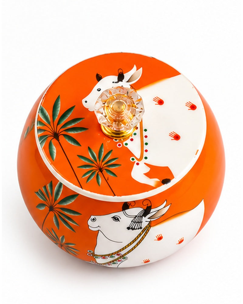 Pichwai art jar, Orange Cow, top view of lid and knob