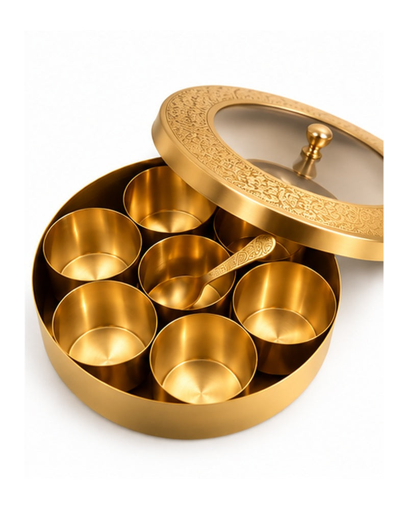 Brass spice box with see-through lid tilted open