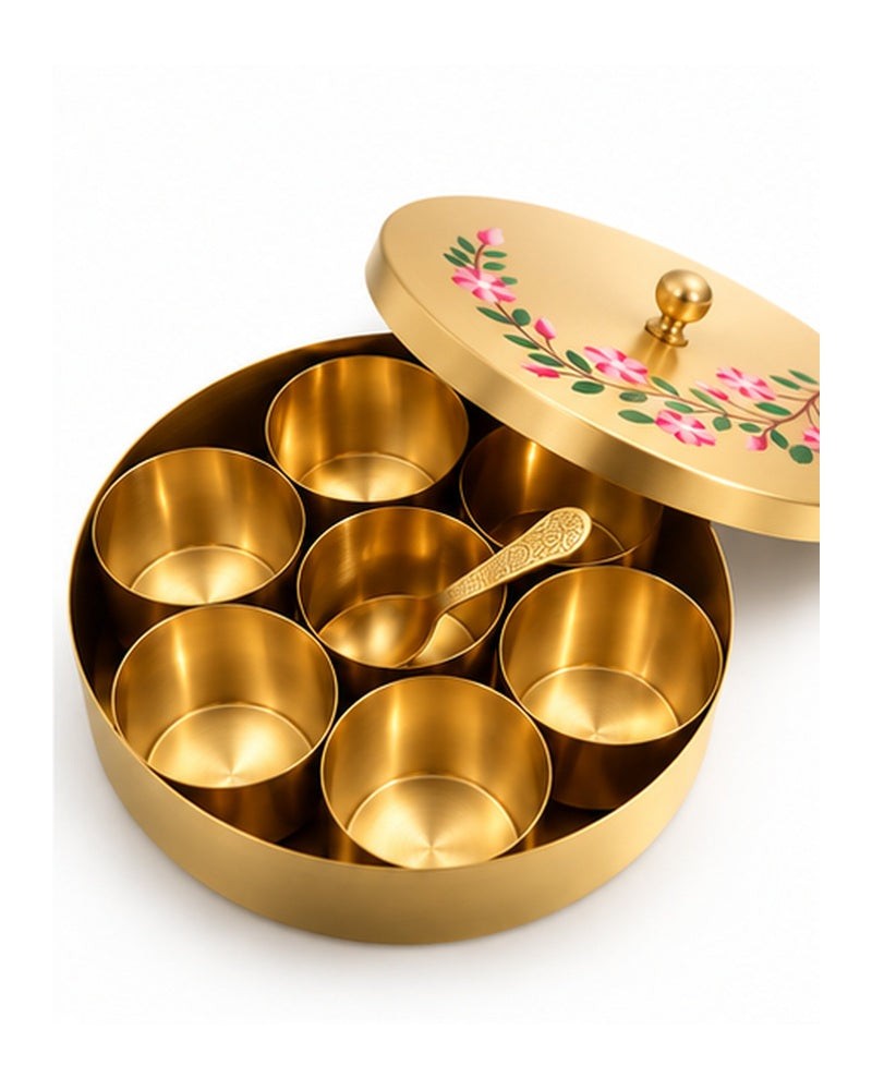 Floral brass masala dabba with lid tilted open