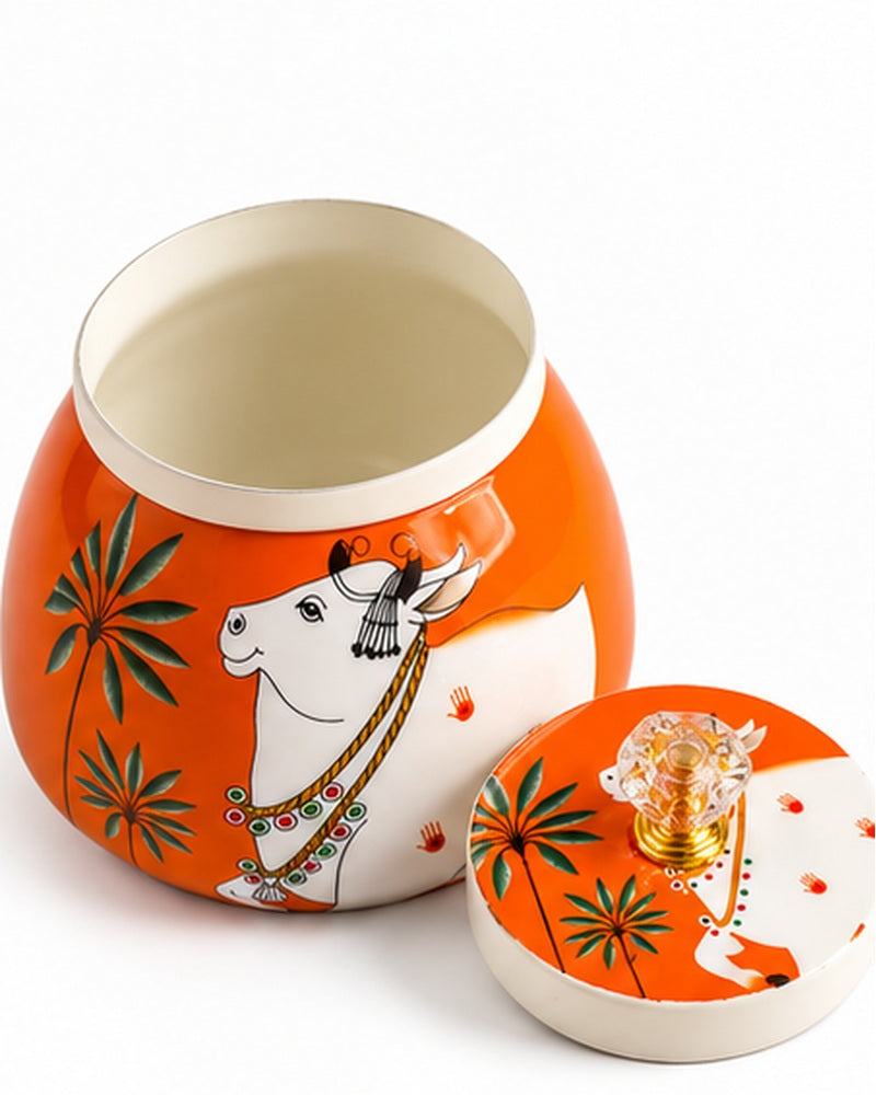 Pichwai art jar, Orange Cow, open with lid beside it
