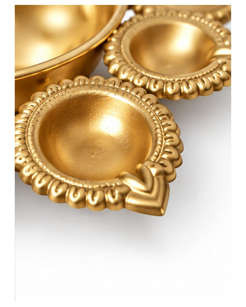 Brass lotus multi-diya platter, diya detail