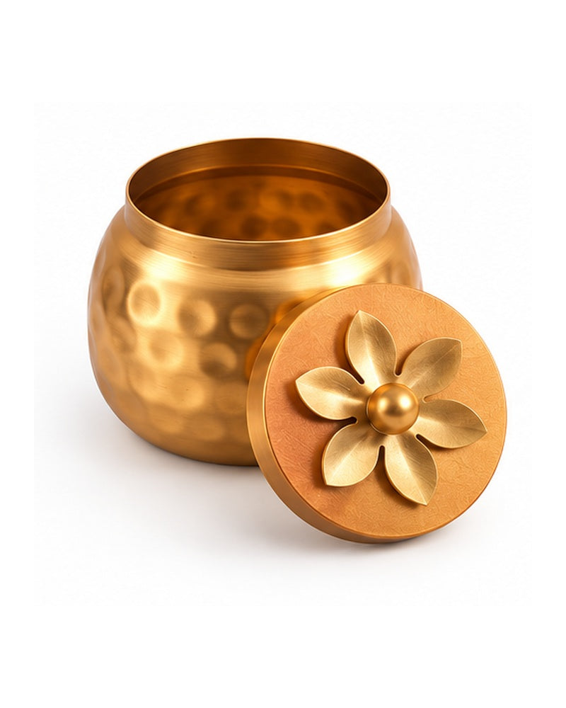 Close-up of a hammered jar with flower-shaped lid
