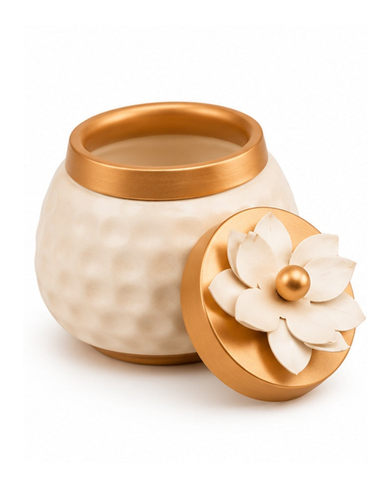 White textured jar with gold rim and blossom lid