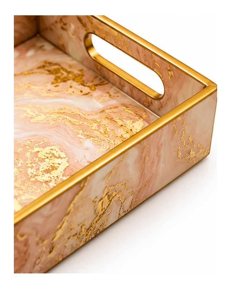 Close-up of gold foil accents and handle on the pink tray