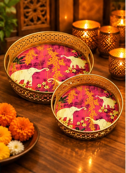 Pink elephant print round jaali trays set of 2, styled in a festive setting