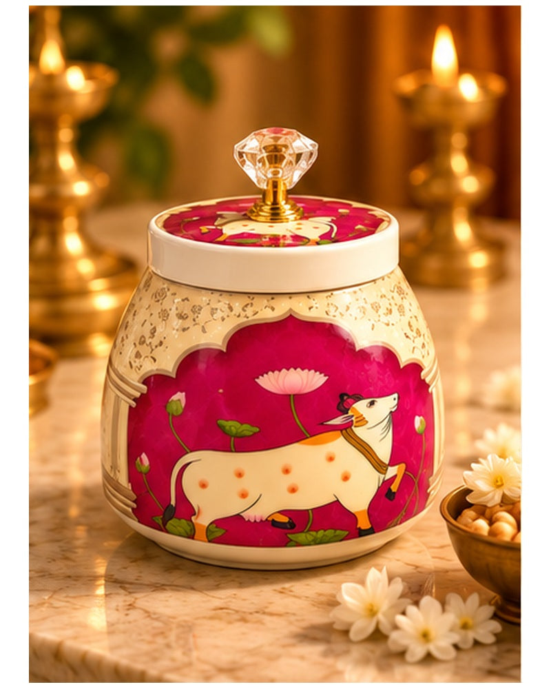 Pichwai art jar, Magenta Cow, styled in a festive setting