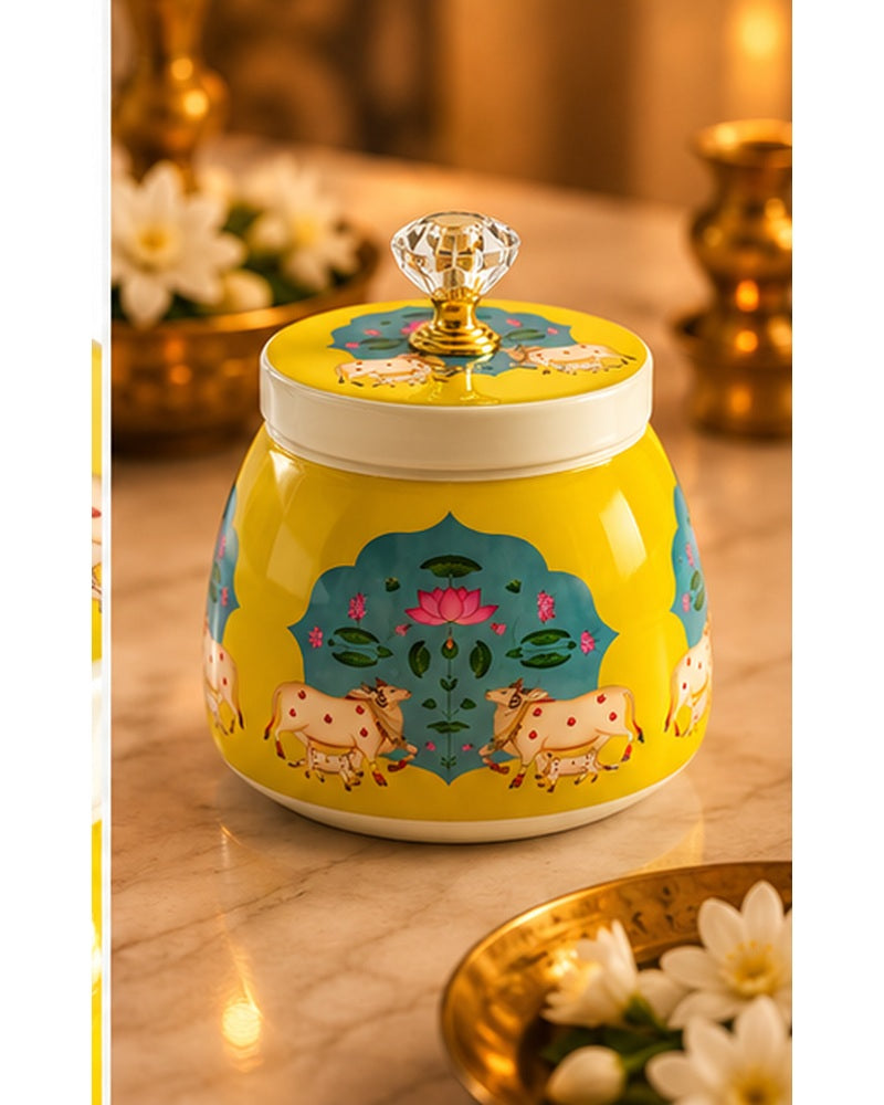 Pichwai art jar, Yellow Cow & Lotus, styled in a warm festive setting