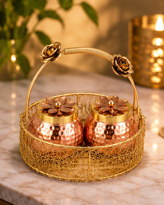 Rose handle basket with copper-tone jars styled on a festive table