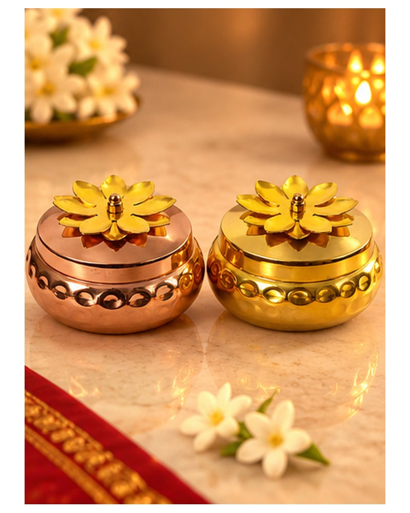 Copper and gold flower lid jars set of 2, styled in a warm festive setting