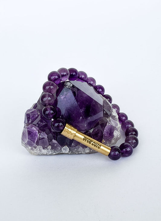 Amethyst crystal bracelet with Manifestation Lock, worn on wrist - Satv Aura