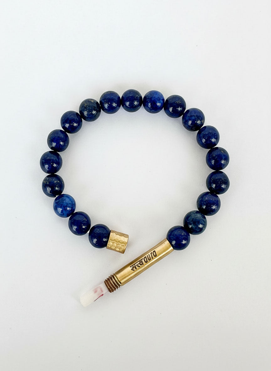 Lapis lazuli stone bracelet worn on wrist