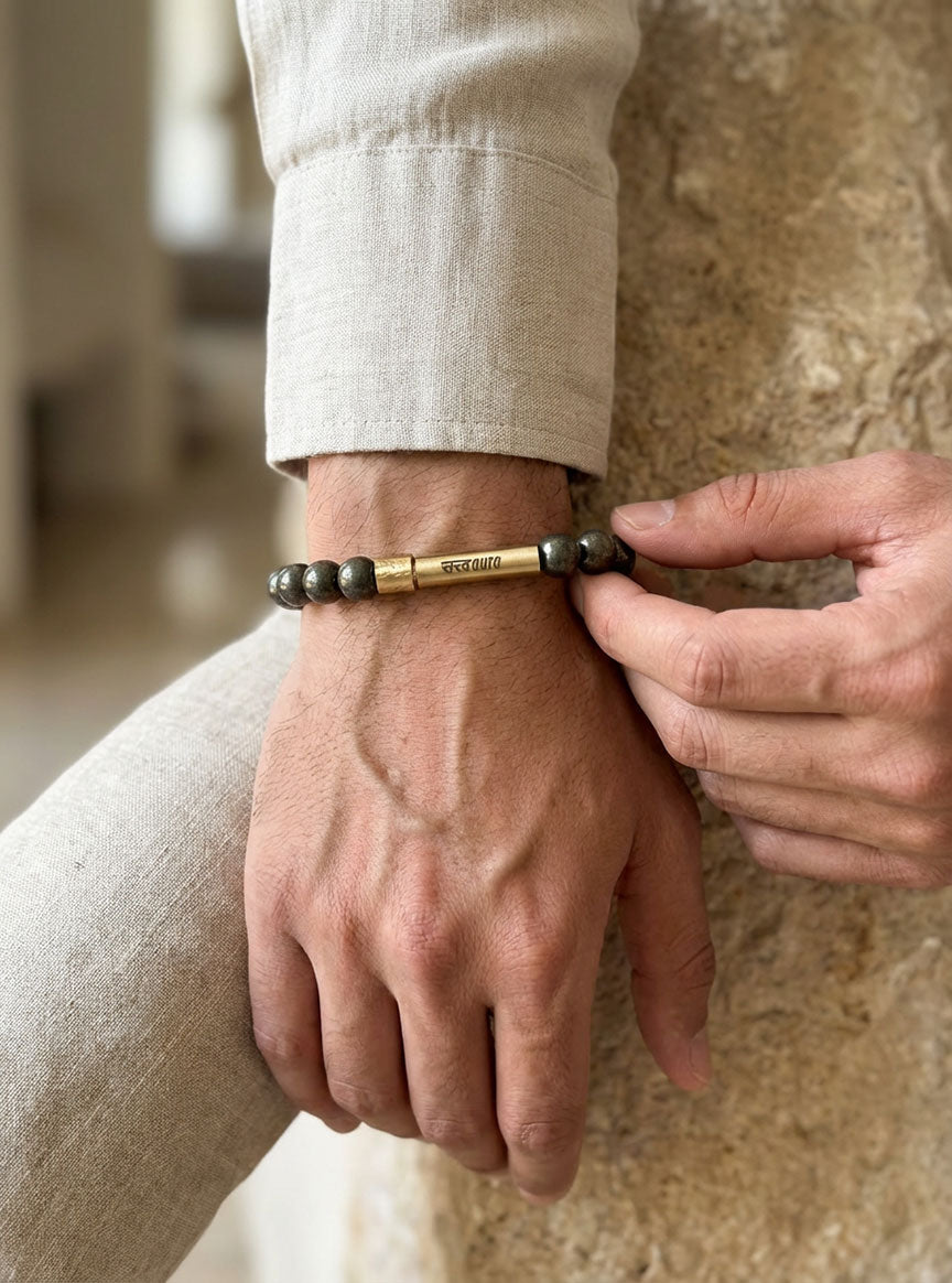 Pyrite stone bracelet worn on wrist