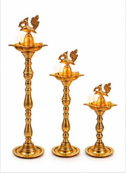 Brass peacock samai diya stands set of 3, front view