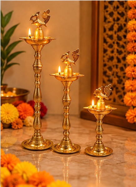 Brass peacock samai diya stands set of 3, styled view
