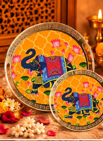 Yellow Pichwai elephant round trays set of 2, styled in a festive setting