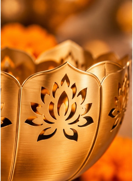 Lotus cut-work gold urli set with votives, close-up detail