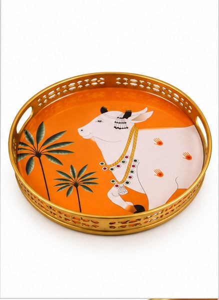 Orange Pichwai cow and palm round trays set of 2, front view