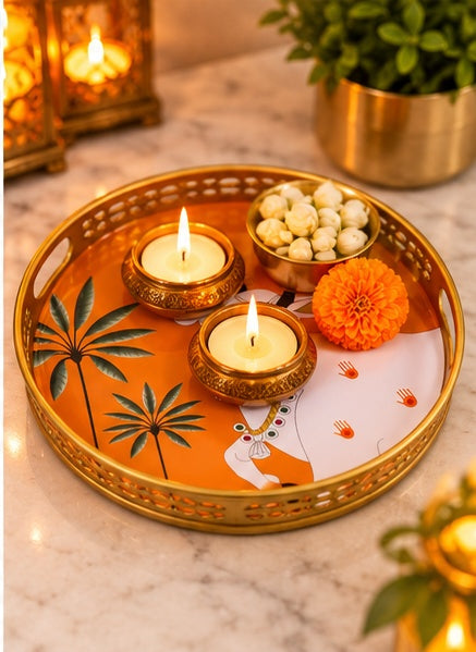 Orange Pichwai cow and palm round trays set of 2, styled view