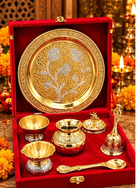 Gold and silver puja thali set in red velvet box