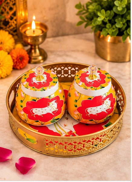Pichwai cow jars set of 2 with round tray, Red & Yellow, styled in a festive setting