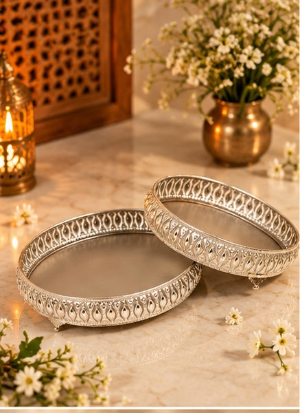 Silver jaali footed round trays set of 2, styled in a festive setting