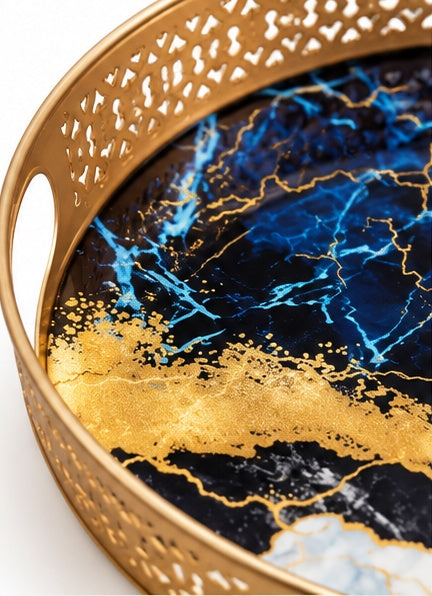 Blue and gold marble look round trays set of 2, close-up detail